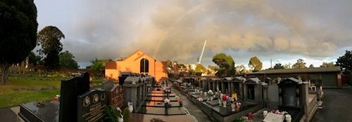 Late spring rainbow and clouds